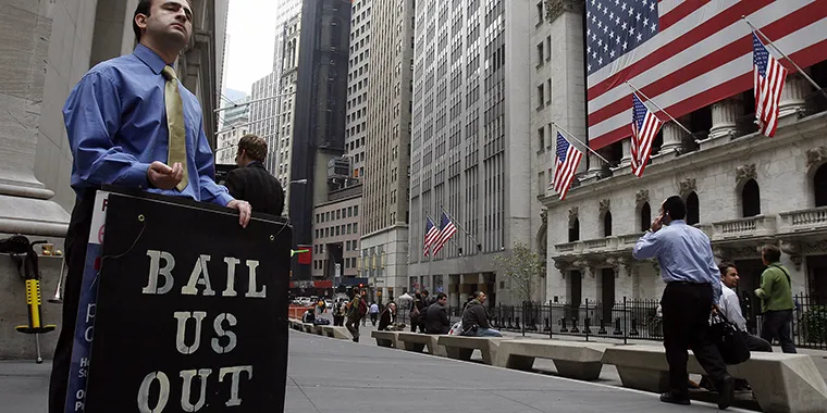 A man protests outside the New York Stock Exchange on Oct. 13, 2008. (Photo via Shannon Stapleton)
