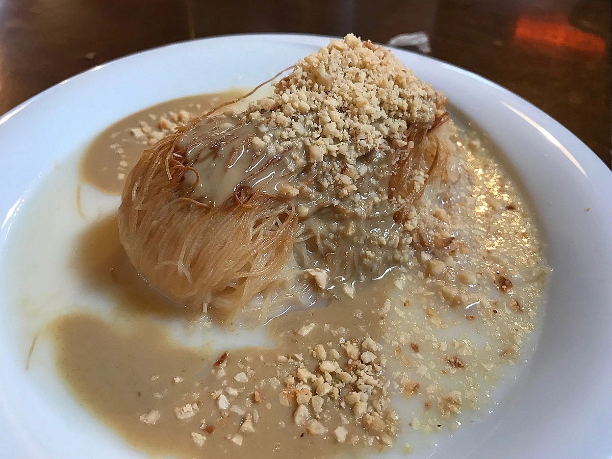 A plate of crispy kadayif dessert soaked in syrup and topped with tahini and crushed walnuts is perfect to end your iftar meal. (Photo by Tarifi Kolay)