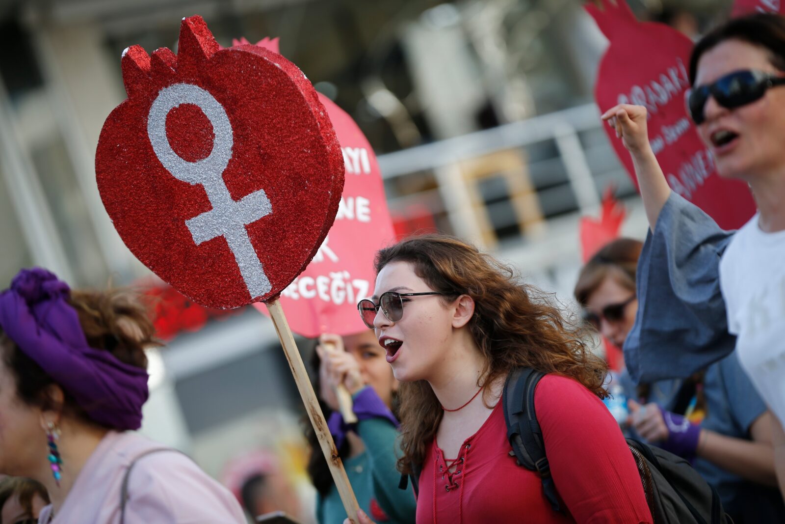 Women march with signs to celebrate International Women's Day in Antalya, March 8, 2020. (AA Photo)
