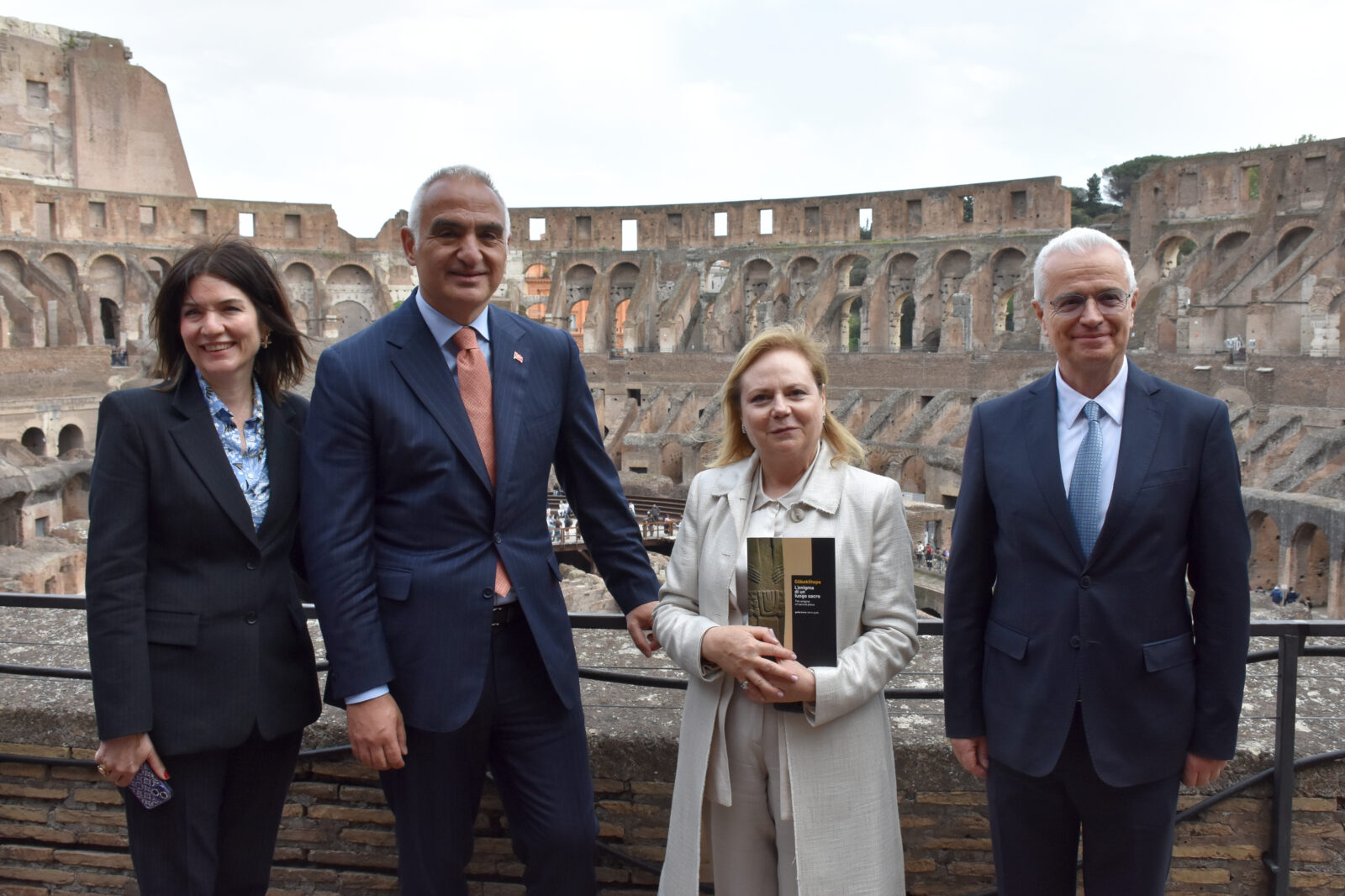 Türkiye’s Minister of Culture and Tourism Mehmet Nuri Ersoy (2nd L), Turkish Ambassador to Rome Elif Comoglu Ulgen (L), former Turkish Ambassador to Rome Omer Gucuk (R), and Director of the Colosseum and Roman Forum Archaeological Site Alfonsina Russo (2nd R) pose for a commemorative photo inside the Colosseum following the closing ceremony for the exhibition titled 