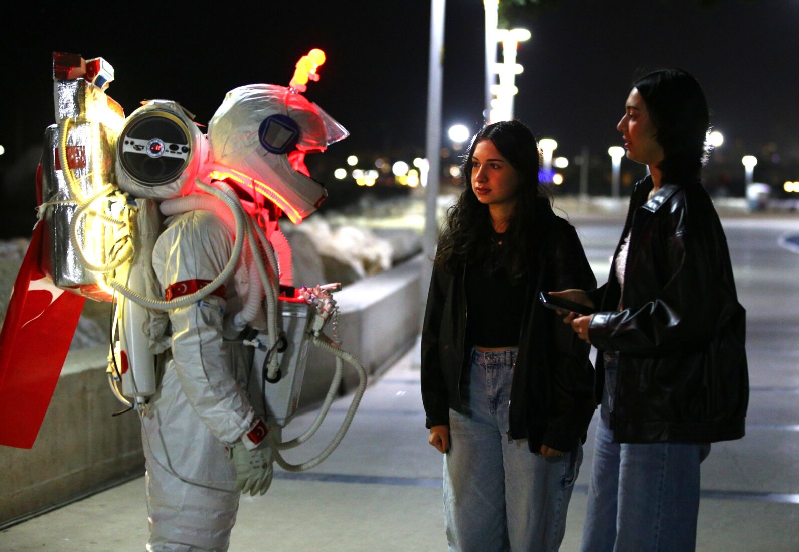 In Mersin, tradesman Zeki Konuk is walking the streets in an astronaut costume made from recycled materials to raise awareness about the importance of water conservation and clean water. (AA Photo)