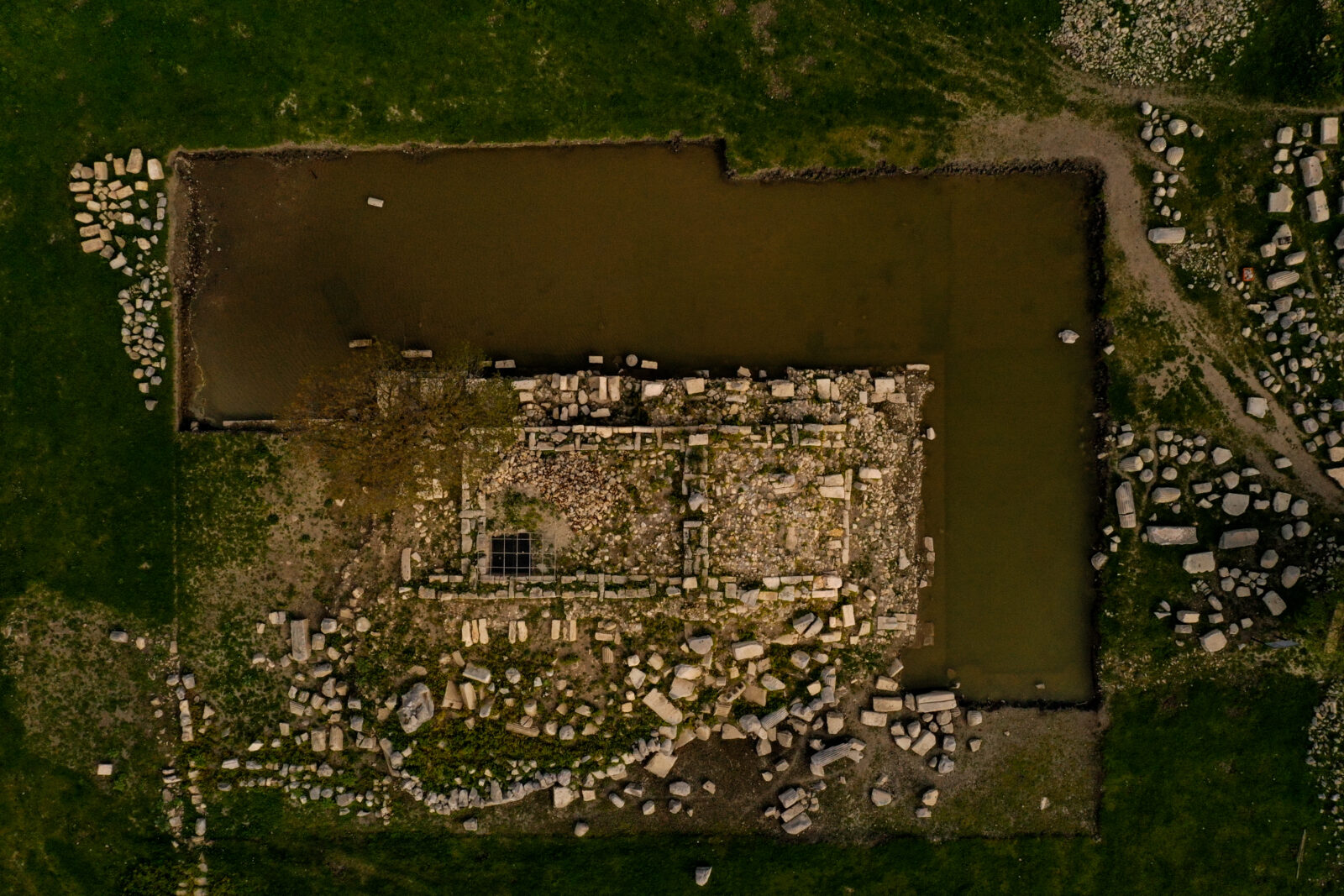 An aerial view of the ancient city of Teos, located in the Seferihisar district as columns around the Temple of Dionysus are being restored to their original standing position, revitalizing the historical heritage, in Izmir, Türkiye, March 31, 2025. (AA Photo)
