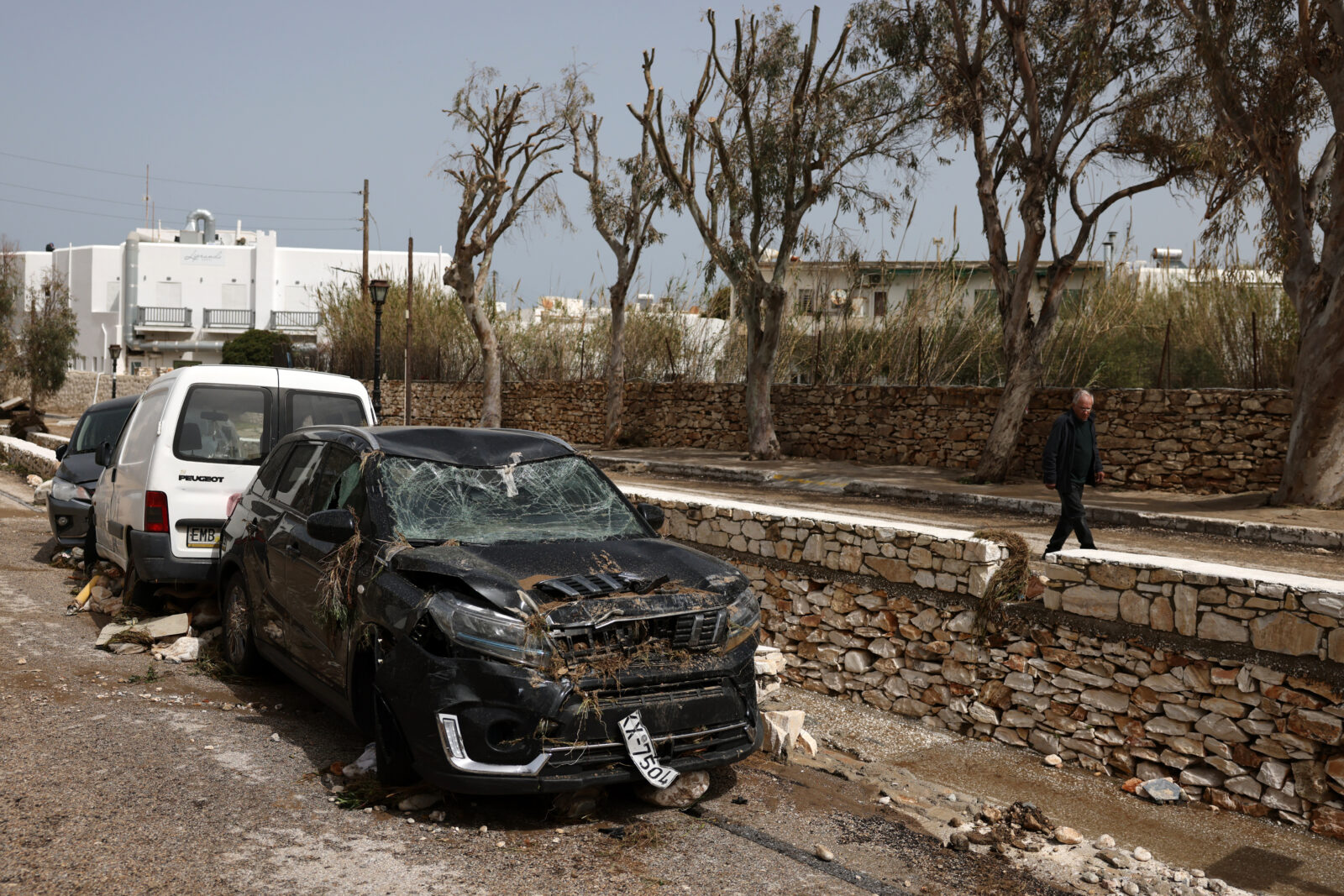 Damaged cars are seen, after heavy rainstorms flood roads, on Island of Paros, Greece, April 1, 2025. (AA Photo)