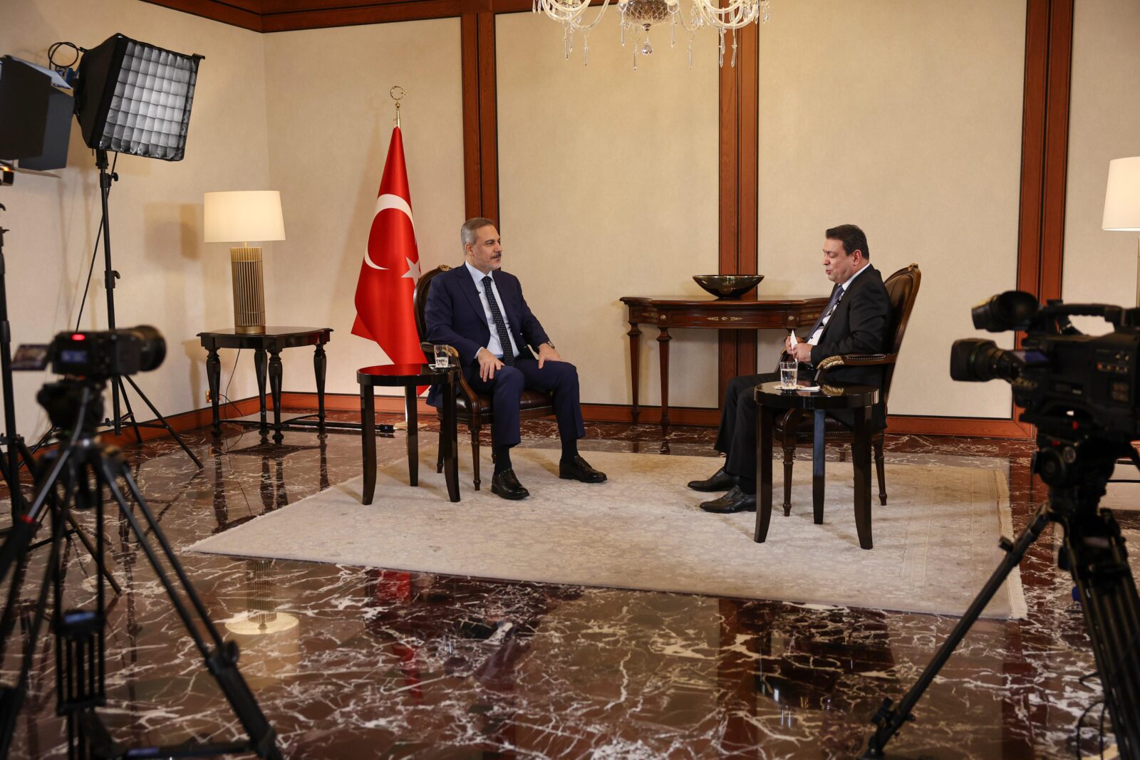 Foreign Minister Hakan Fidan seen speaking during an interview with UTV, Iraqi television based in Baghdad, Iraq on April 07, 2025. (AA Photo)