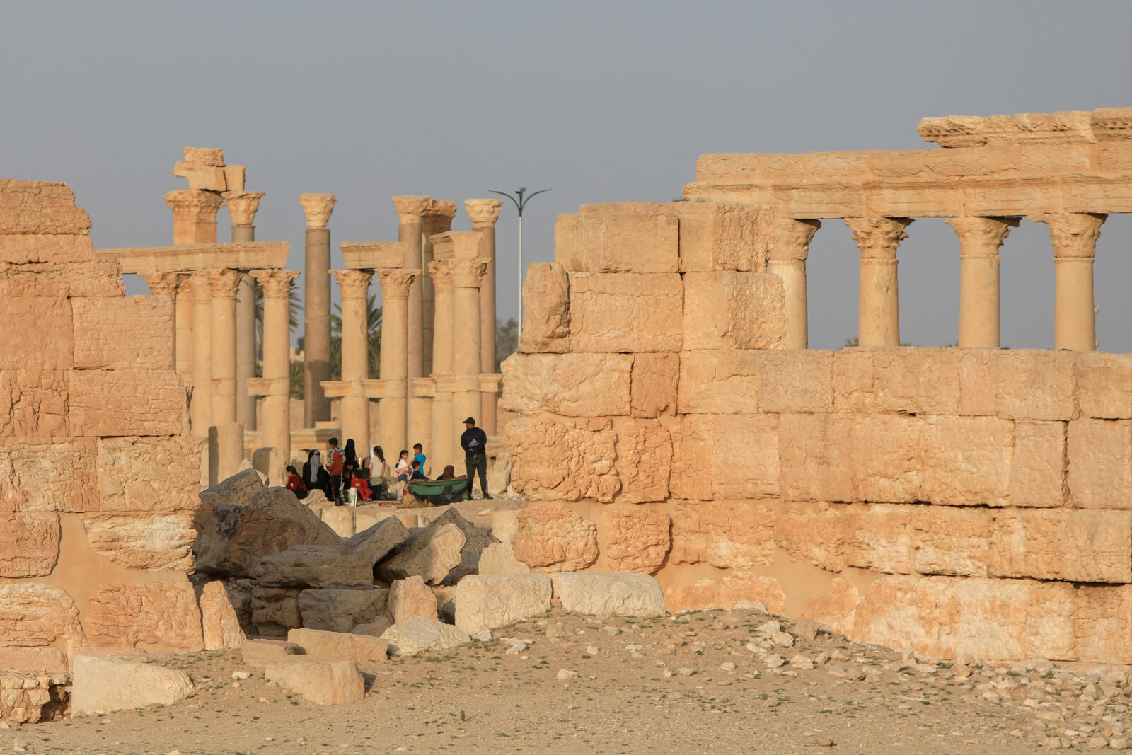 Syrians, including children, spend time among the ruins of the Palmyra, an ancient city, which was listed as a World Heritage Site by UNESCO in 1980 and destroyed by Daesh terrorist group in 2015, are seen in Homs Governorate, Syria, April 4, 2025. (AA Photo)