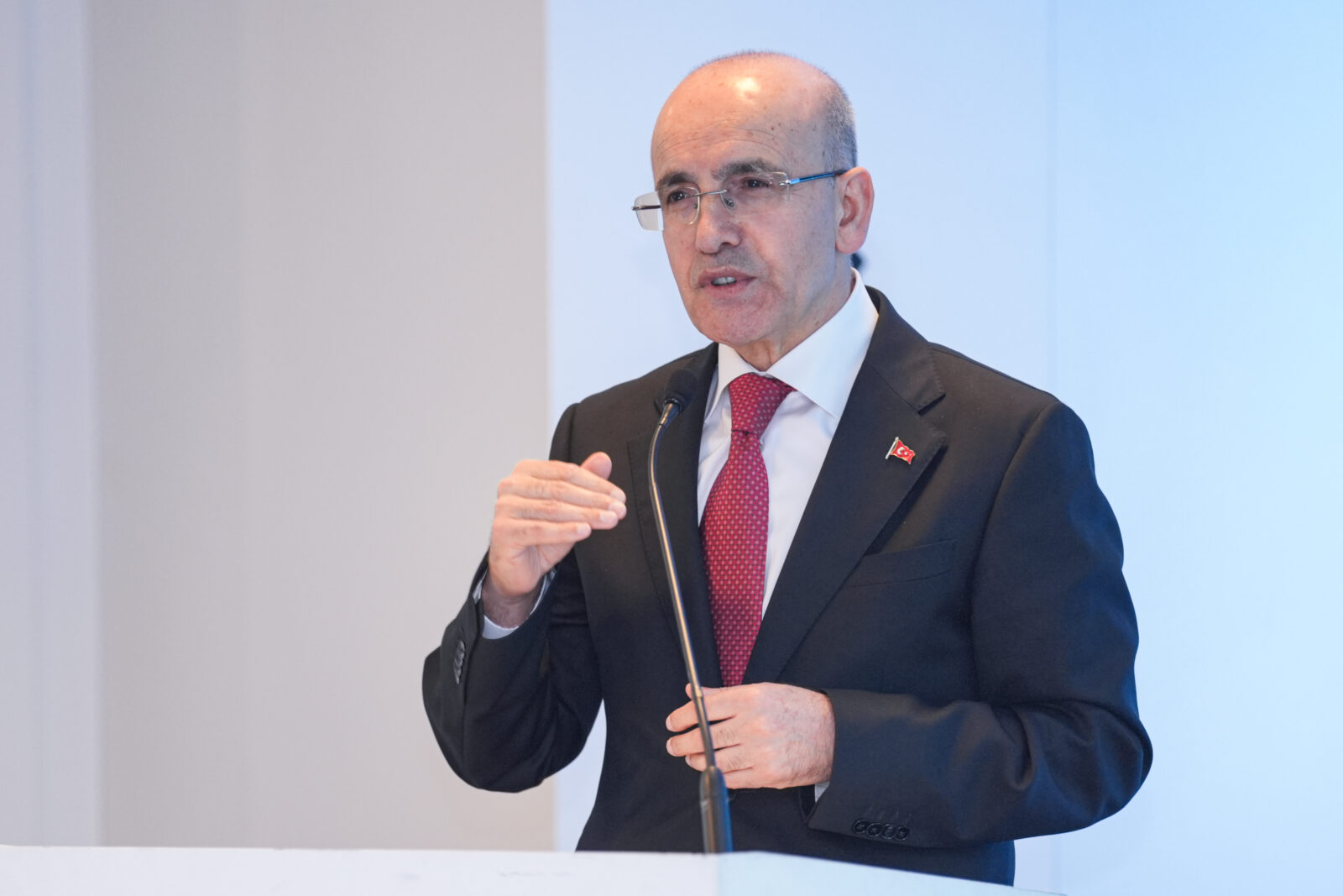 Treasury and Finance Minister Mehmet Simsek addresses attendees at the launch of the OECD Economic Survey in Istanbul, Türkiye, on April 10, 2025. (AA Photo)