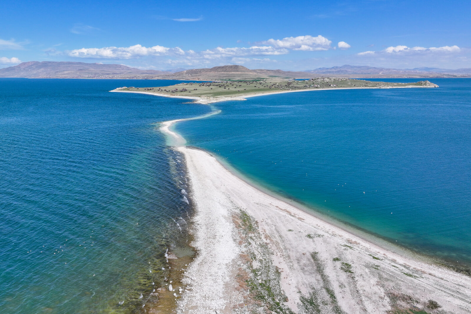 An aerial view shows the ancient road to Carpanak Island in Lake Van, where water loss due to drought and excessive evaporation has caused some historical structures and microbialites, formed over thousands of years, to become visible as a result of shoreline retreat, in Van, Türkiye, April 11, 2025. (AA Photo)