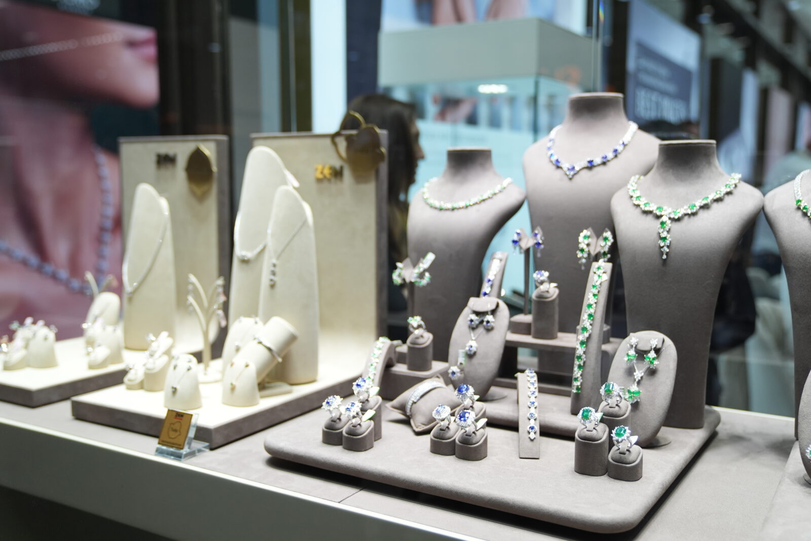 High-end gemstone rings and necklace sets are showcased at a jewelry booth during the Istanbul Jewelry Show at the Istanbul Expo Center, Türkiye, on April 16, 2025. (AA Photo)