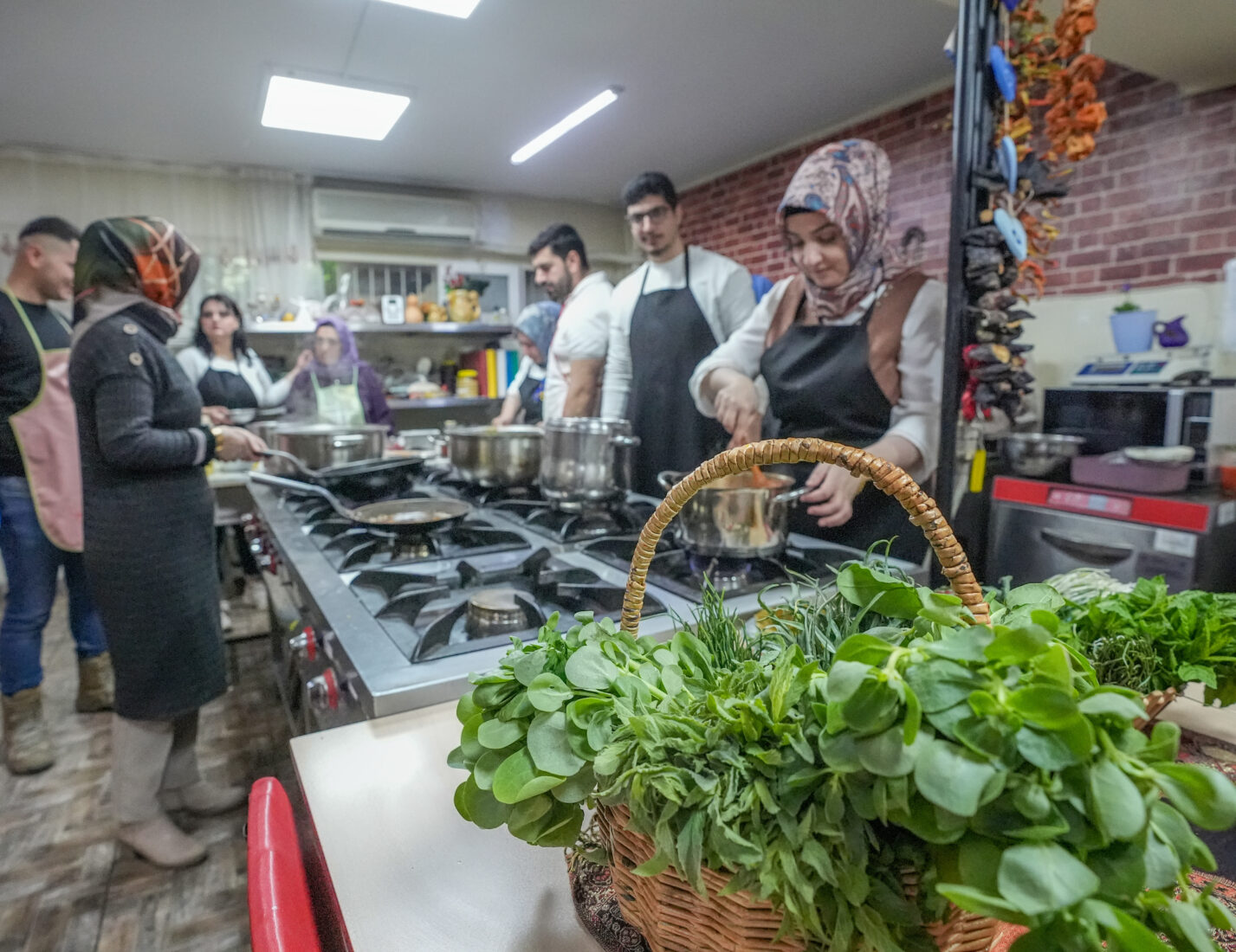 Wild herbs from Diyarbakir’s Hevsel Gardens, a UNESCO World Heritage Site, are turned into flavorful dishes in the Yenisehir Public Education Center kitchen, Türkiye, April 21, 2025. (AA Photo)