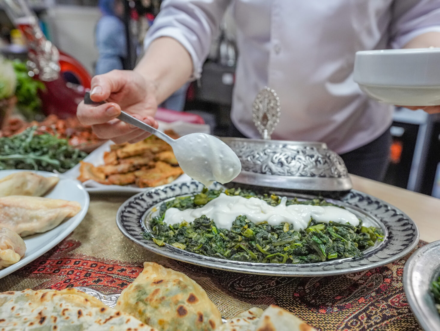 Wild herbs from Diyarbakir’s Hevsel Gardens, a UNESCO World Heritage Site, are turned into flavorful dishes in the Yenisehir Public Education Center kitchen, Türkiye, April 21, 2025. (AA Photo)