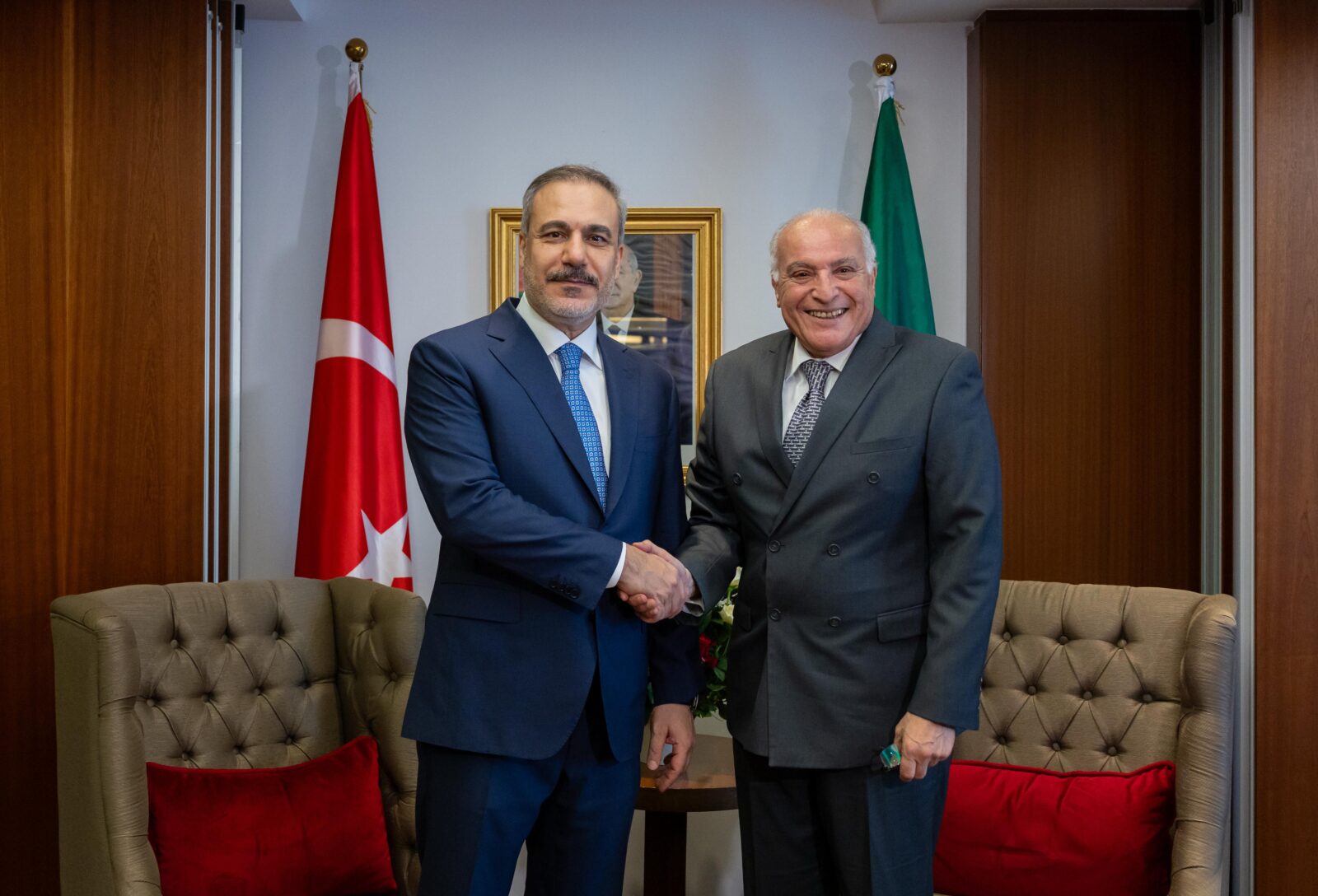 Foreign Minister Hakan Fidan (L) shakes hands with Algerian Foreign Minister Ahmed Attaf (R) in Algiers, Algeria on April 21, 2025. (AA Photo)