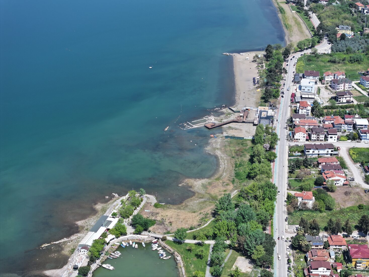 An aerial view of preparations for a planned religious ceremony around the submerged basilica ruins, discovered in 2014 in Lake Iznik, Bursa, Türkiye, believed to have been built in honor of Saint Neophytos, April 22, 2025. (AA Photo)