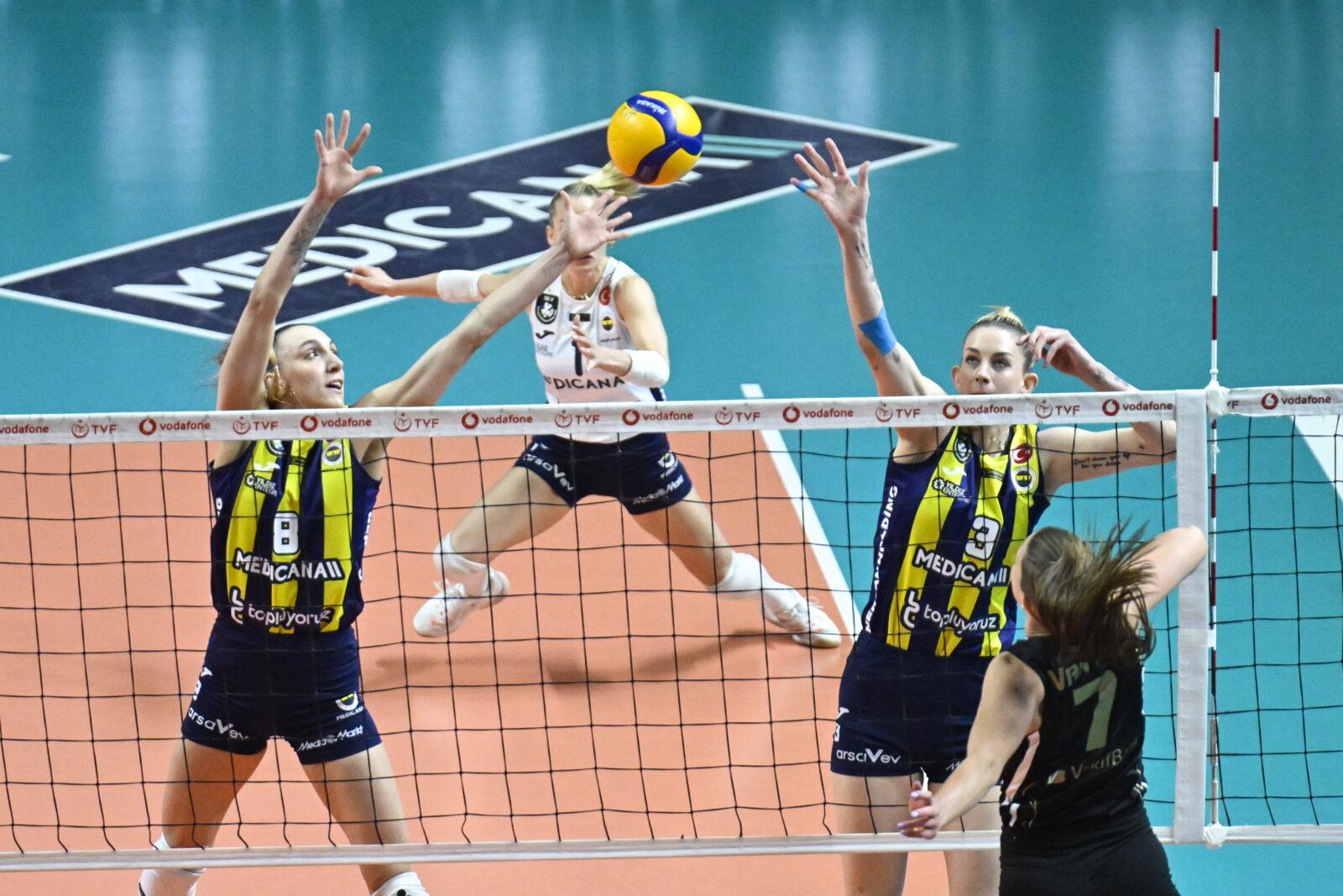 Fenerbahce Medicana and VakifBank face off in the third match of the Vodafone Sultans League finale series at Burhan Felek Vestel Volleyball Hall, as Fenerbahce’s Asli Kalac (8) and Magdalena Stysiak (3) contest a point against VakifBank’s Reene Van (7), Istanbul, Türkiye, April 22, 2025. (AA Photo)