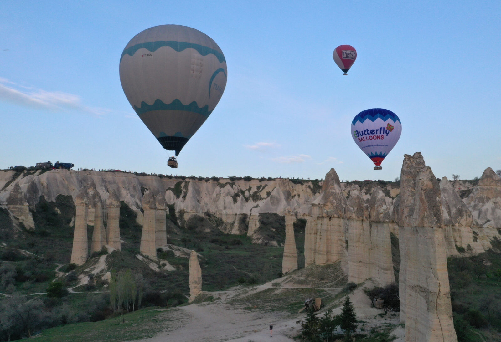 While Cappadocia welcomes millions of tourists every year, hot air balloons with tourists take flight at sunrise, Nevsehir, Türkiye, April 22, 2025. (AA Photo)