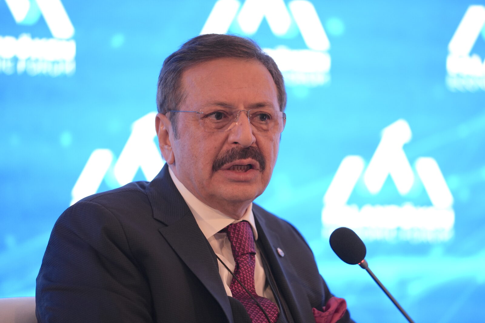 Rifat Hisarciklioglu, president of the Union of Chambers and Commodity Exchanges of Türkiye (TOBB) and the World Chambers Federation (WCF), speaks during the Palandoken Economic Forum in Erzurum, Türkiye, on April 26, 2025. (AA Photo)