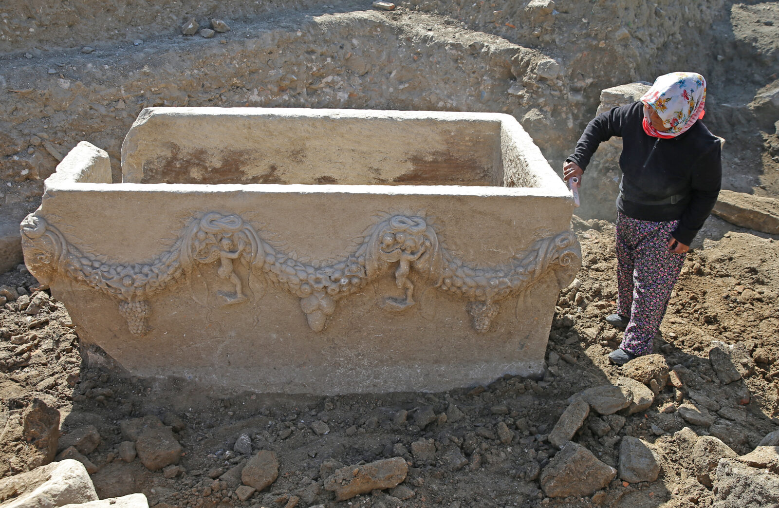A view of the garlanded sarcophagus, adorned with wreaths made of fruits, flowers, and leaves, after it has been discovered at Stratonikeia ancient city, located in the Yatagan district of Mugla, Türkiye, April 16, 2025. (AA Photo)