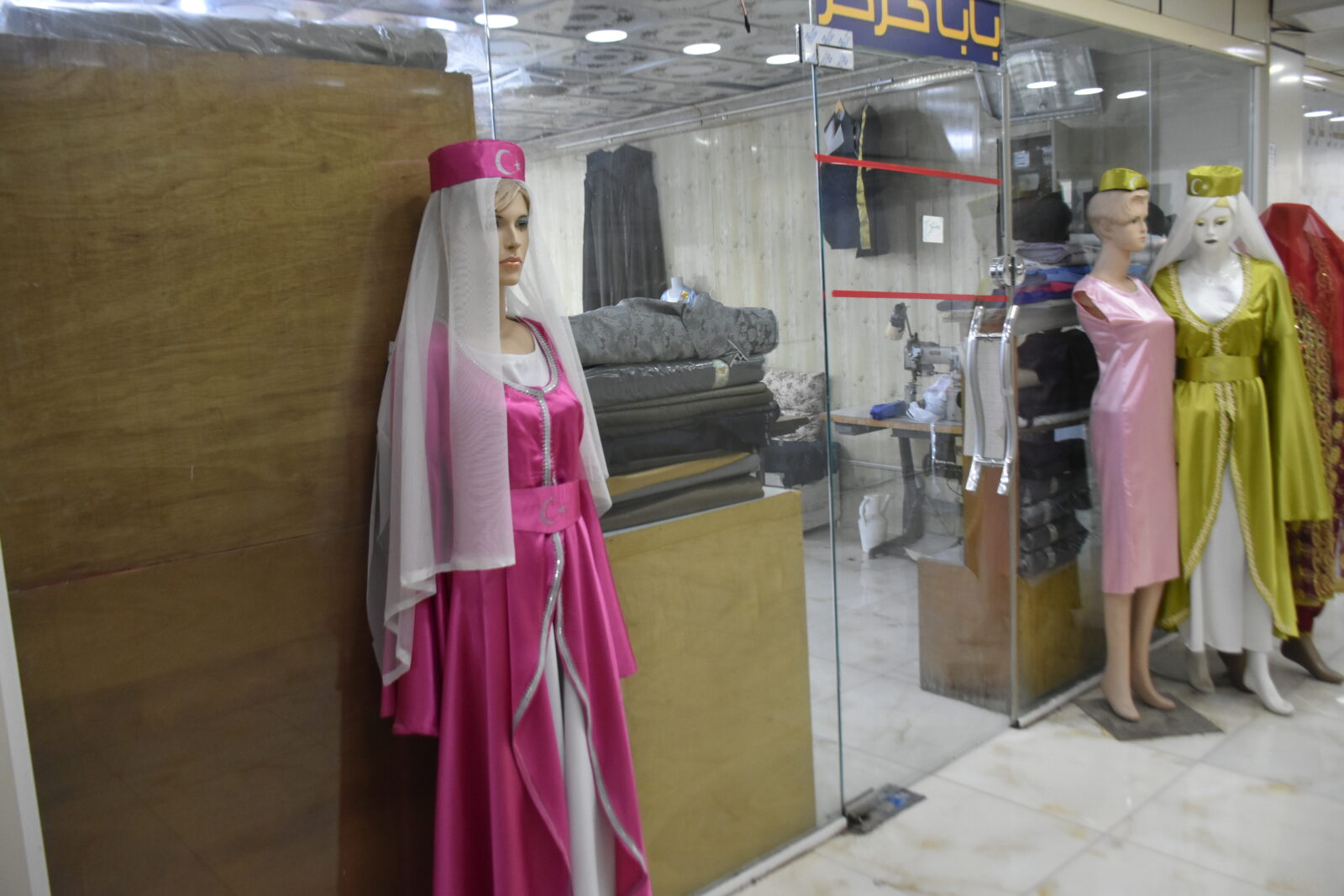 The traditional attire of Iraqi Turkmens is displayed on a mannequin for sale at a tailor's shop in Kirkuk, Iraq, April 29, 2025. (AA Photo)