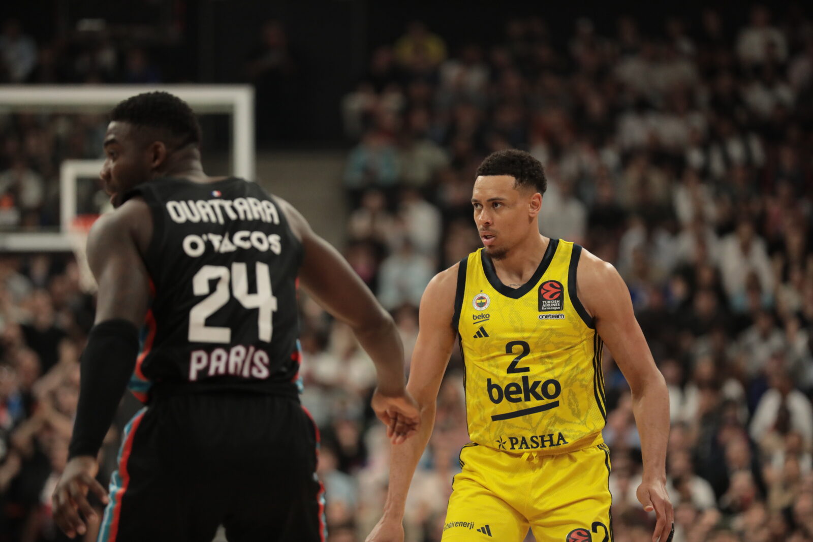 Wade Baldwin IV (2) of Fenerbahce Beko in action against Billy Ouattara (24) of Paris Basketball during the Turkish Airlines EuroLeague playoff 3rd match between Paris Basketball and Fenerbahce Beko at Adidas Arena in Paris, France on April 29, 2025. (AA Photo)