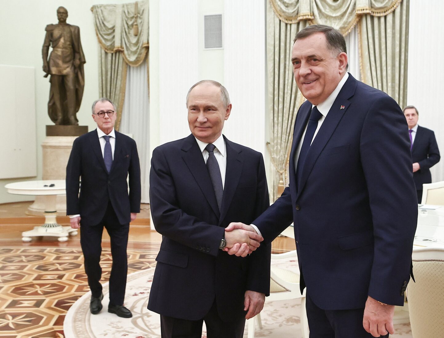 In this pool photograph distributed by the Russian state agency Sputnik, Russia's President Vladimir Putin meets with Bosnian Serb leader Milorad Dodik at the Kremlin in Moscow, April 1, 2025. (AFP Photo)