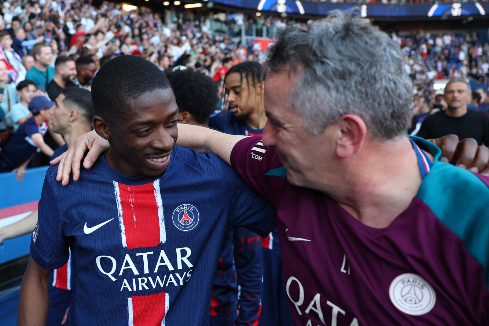 Paris Saint-Germain's French forward #10 Ousmane Dembele (L) celebrates after winning the match and the French championship title following the French L1 football match between Paris Saint-Germain (PSG) and SCO Angers at The Parc des Princes Stadium in Paris on April 5, 2025. (AFP Photo)