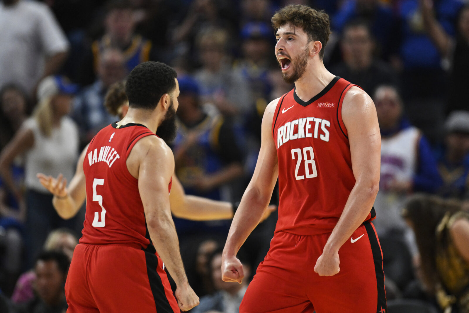 Alperen Sengun #28 of the Houston Rockets, celebrates with Fred VanVleet #5 against the Golden State Warriors in the second quarter at Chase Center in San Francisco, California, April 6, 2025. (AFP Photo)