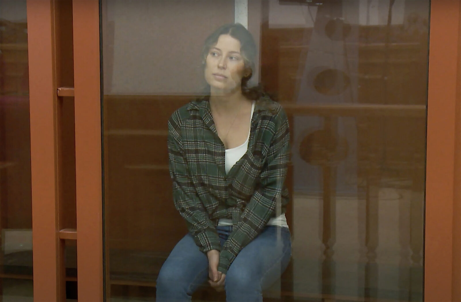 US-Russian citizen Ksenia Karelina sitting in a cage at The Sverdlovsk Regional Court in Yekaterinburg, Russia on June 20, 2024, (AFP Photo)
