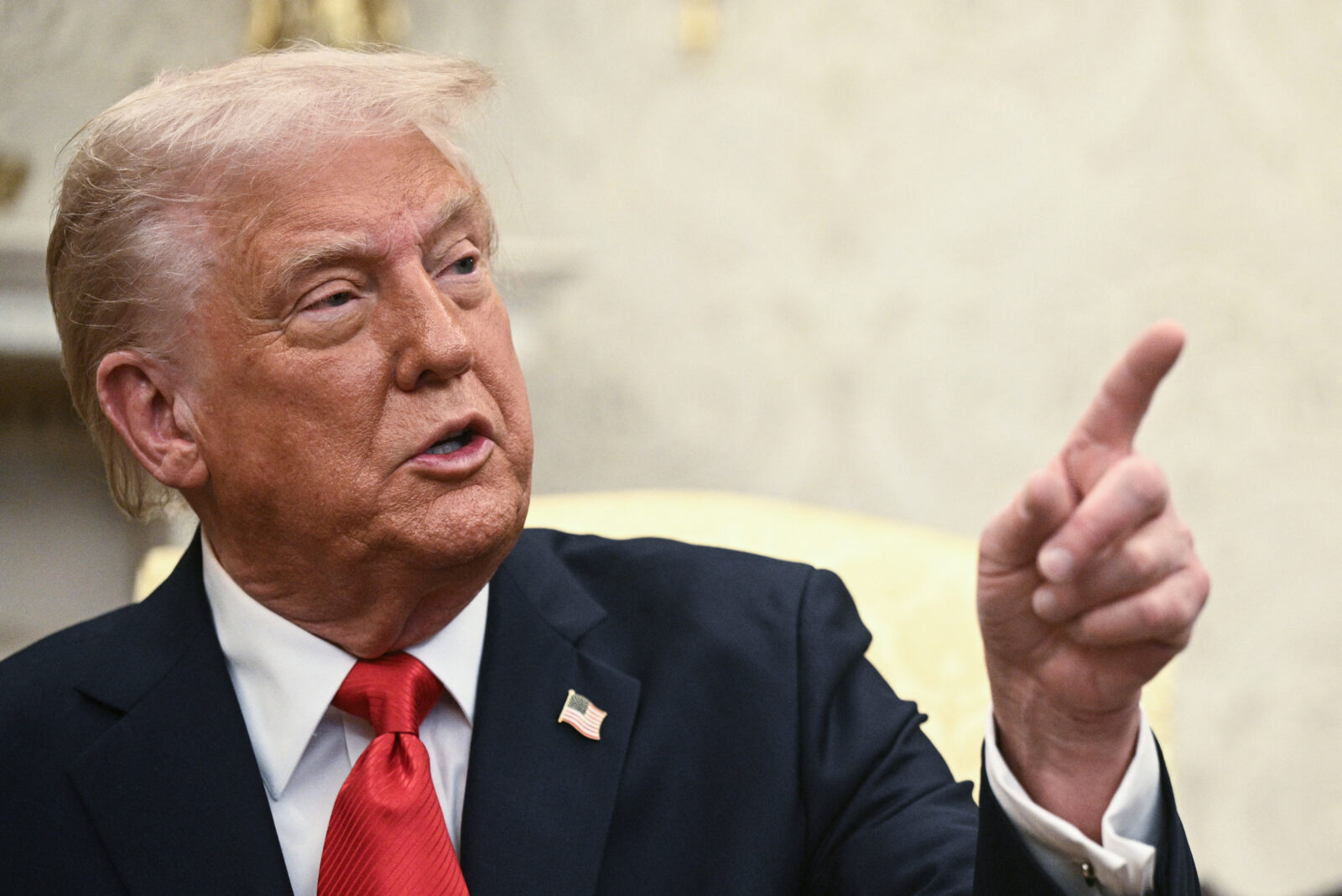 Trump accuses Iran of delaying nuclear deal, warns of possible military strike