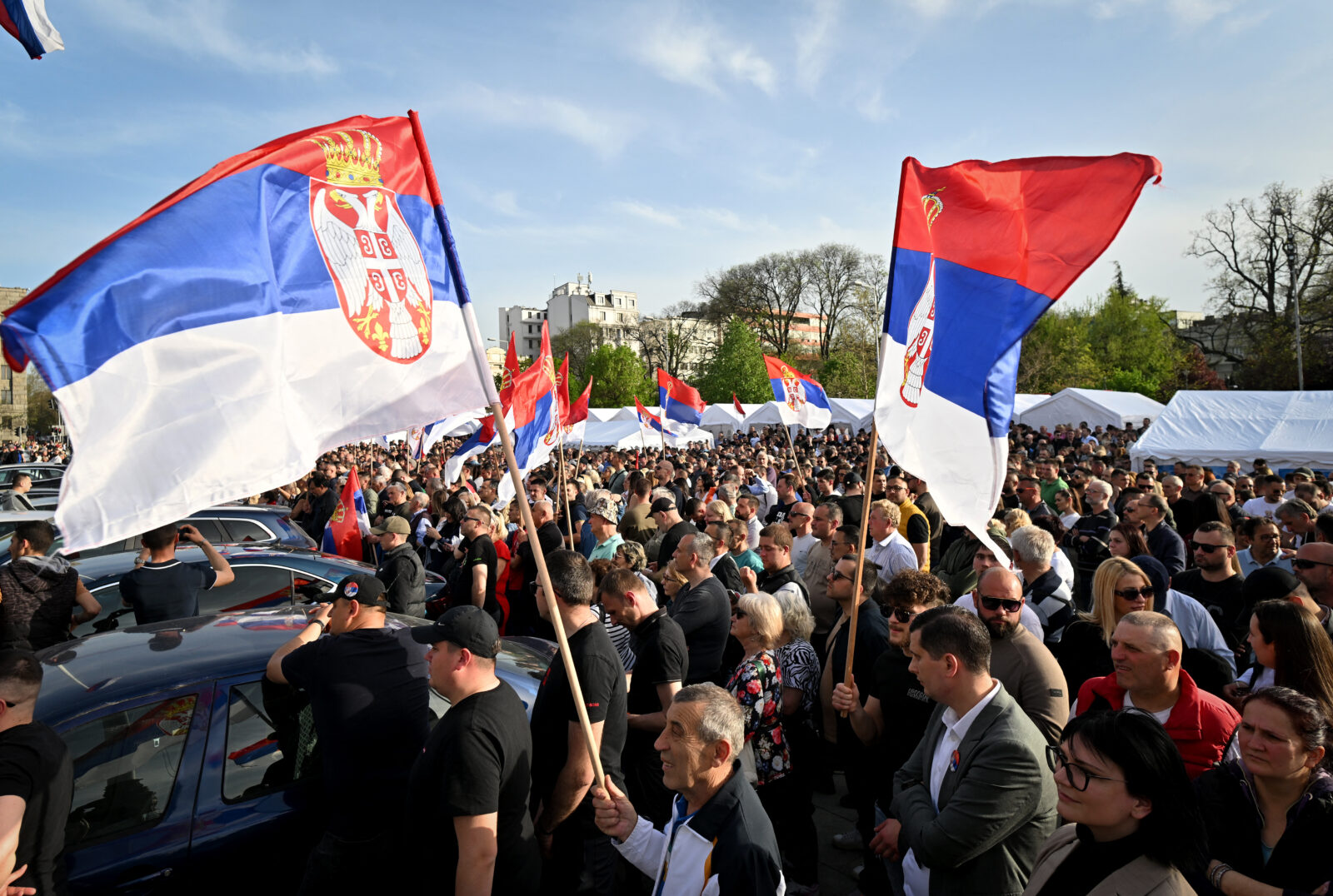 Demonstrators with Serbian flags attend a pro-government rally in front of the parliament in Belgrade, Serbia on April 16, 2025. (AFP Photo)