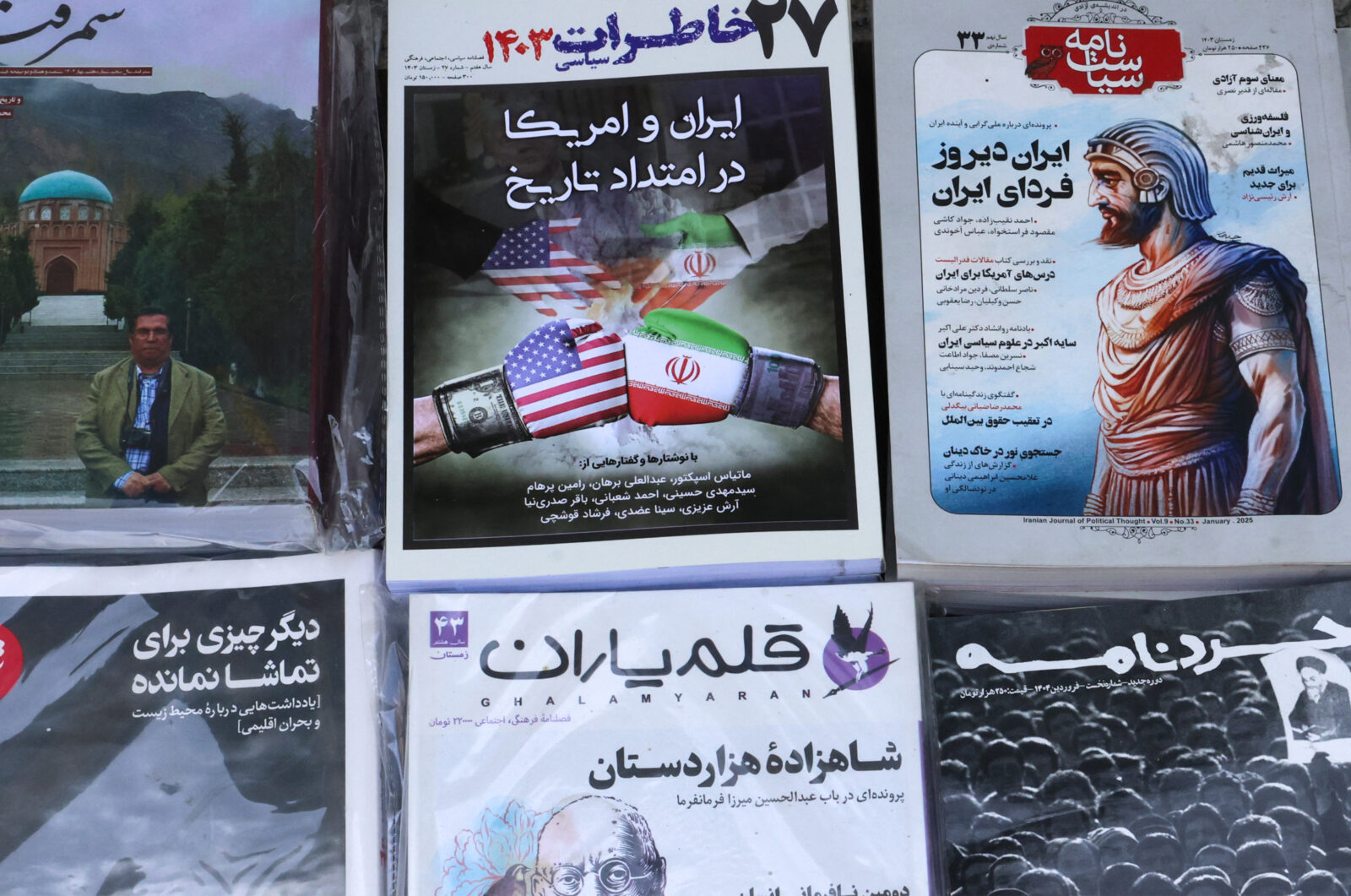 This picture shows newspaper front page headlines at a kiosk in Iranian capital, featuring the Iran-U.S. talks on the Iranian nuclear programme, Tehran, Iran, April 19, 2025. (AFP Photo)