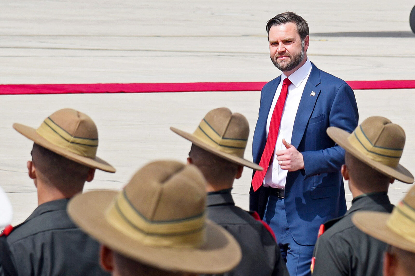U.S. Vice President JD Vance gestures as he inspects a guard of honour upon his arrival at the airport in New Delhi, India, on April 21, 2025. (AFP Photo)