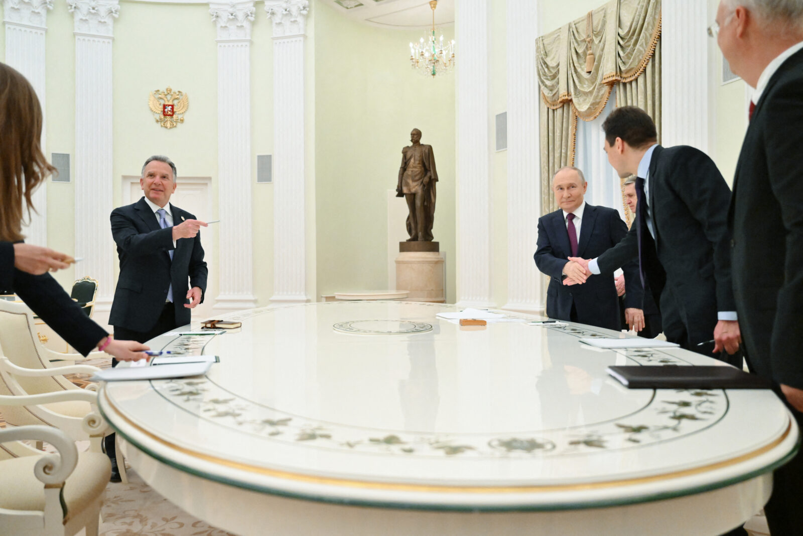 In this pool photograph distributed by Russian state agency Sputnik, Russia's President Vladimir Putin (4th R) and US Special Envoy Steve Witkoff (L) arrive for their talks in Moscow, Russia on April 25, 2025. (AFP Photo)