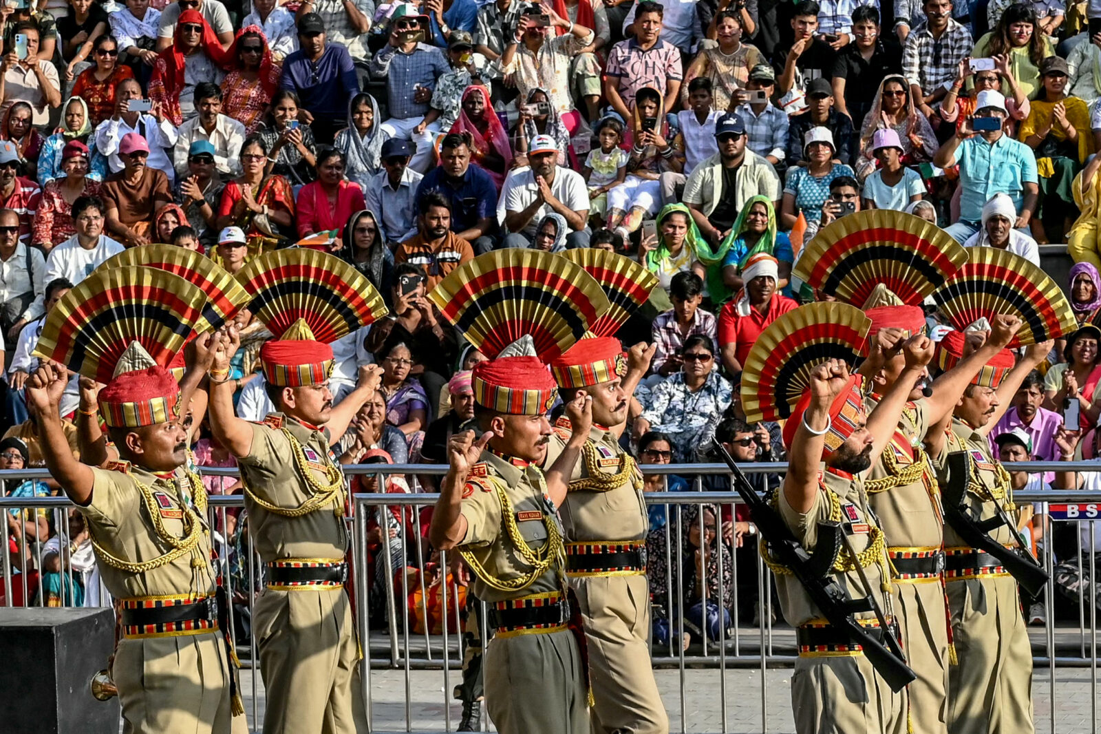 Indian Border Security Force (BSF) personnel perform during the beating retreat ceremony at the border gates of India and Pakistan, at the Wagah border post, about 35 km from Amritsar on April 25, 2025. (AFP Photo)