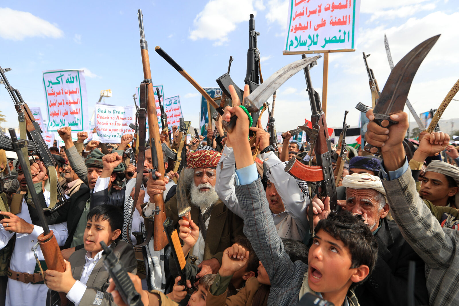 Armed Yemenis chant slogans during a rally in solidarity with Palestinians in the Gaza Strip and in condemnation of US strikes, in the Houthi-controlled capital Sanaa, Yemen on April 25, 2025. (AFP Photo)