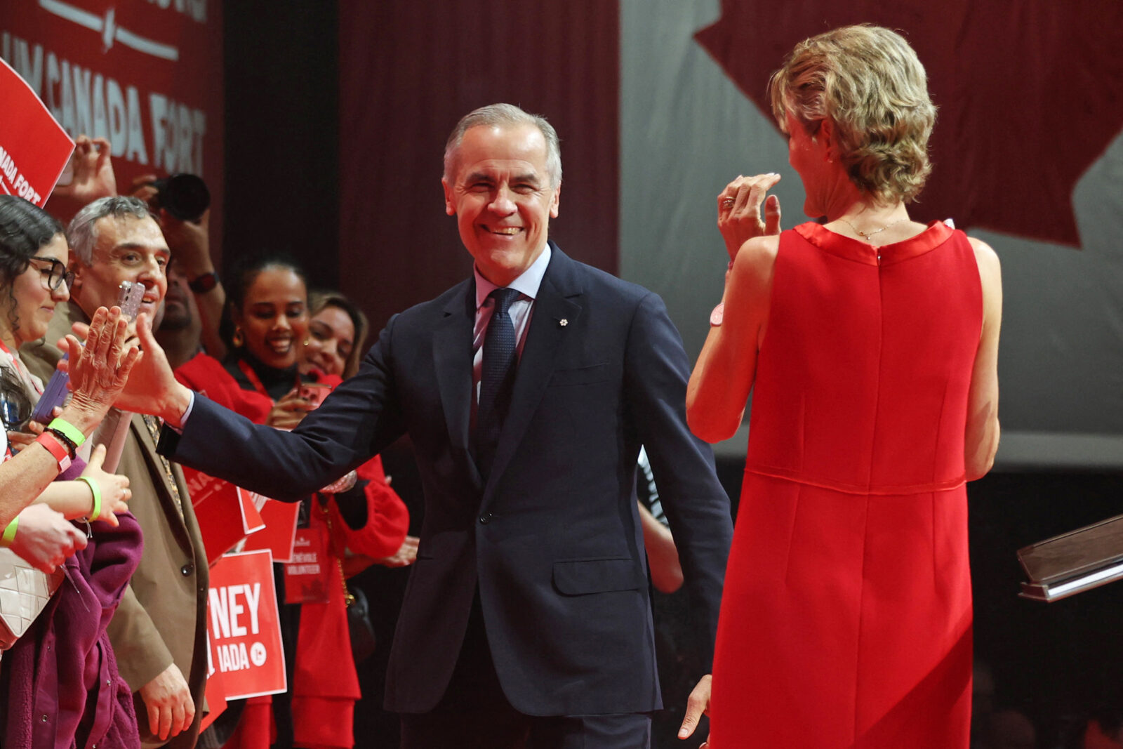 Canada's Prime Minister and Liberal Party leader Mark Carney and his wife Diana Fox Carney greet supporters at a victory party in Ottawa, Ontario, on April 29, 2025. (AFP Photo)