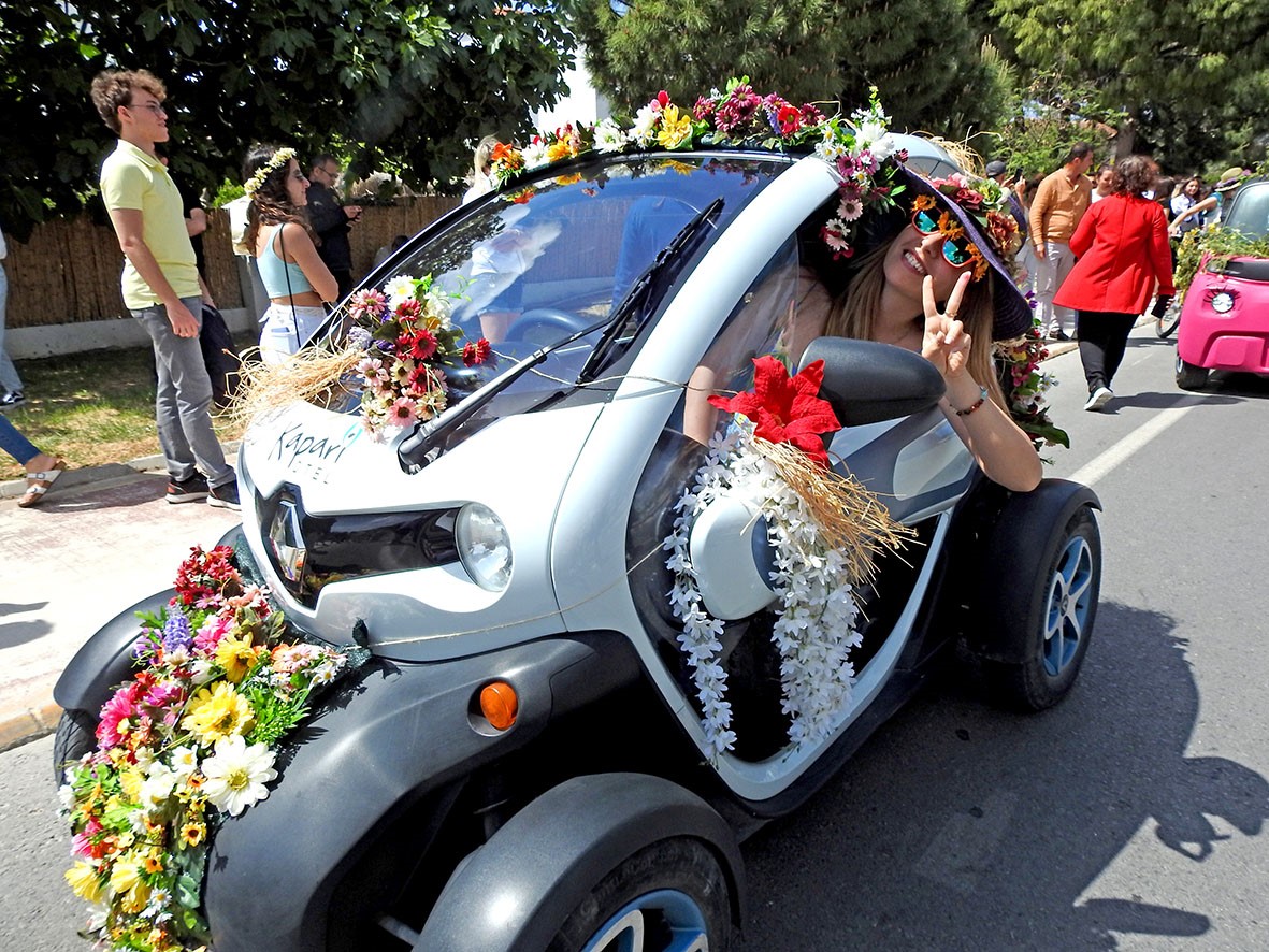 A parade during the second day of the 13th Alacati Herb Festival in Cesme district of Izmir, Türkiye, April 19, 2024. (IHA Photo)