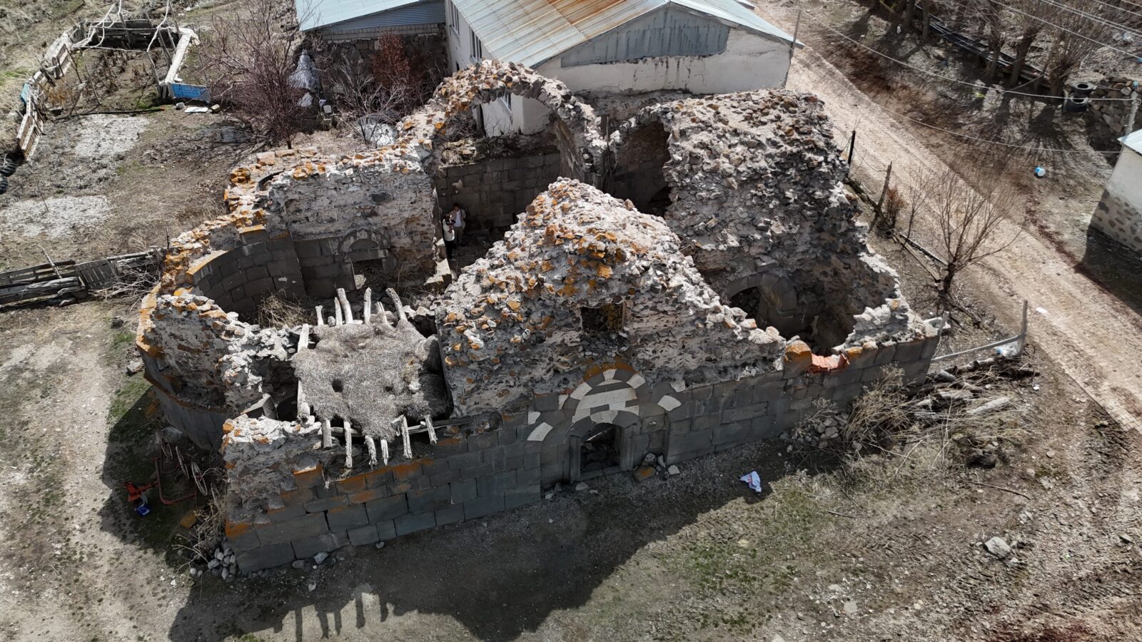 The Mancilik Church, located in the Kangal district of Sivas, Türkiye, which has been plundered by treasure hunters for years, on April 6, 2025. (IHA Photo)