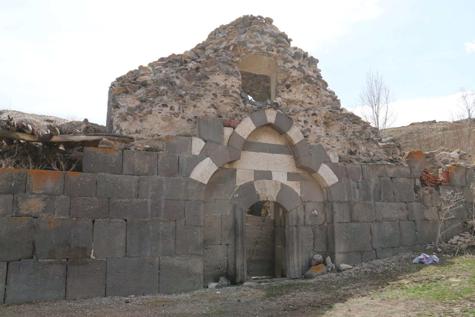 The Mancilik Church, located in the Kangal district of Sivas, Türkiye, which has been plundered by treasure hunters for years, on April 6, 2025. (IHA Photo)