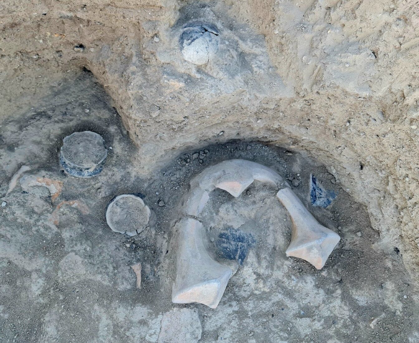 A photo showing the moment the two sacred hearths and terracotta vessels were discovered during excavations at Elazig Tadim Castle and mound, Türkiye, April 21, 2025. (IHA Photo)