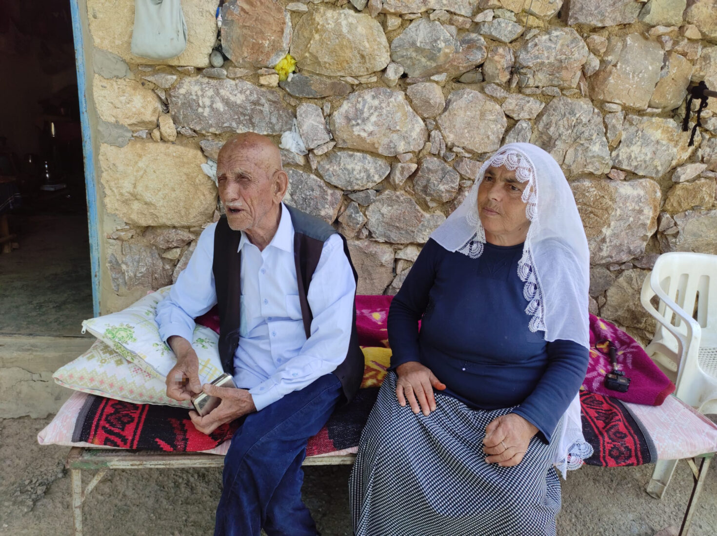 Mehmet Resit Ak (L), 136, and his 78-year-old wife Dilsen Ak (R), who live in the village of Gecitalti in Kozluk district of Batman, Türkiye, April 30, 2025. (IHA Photo)