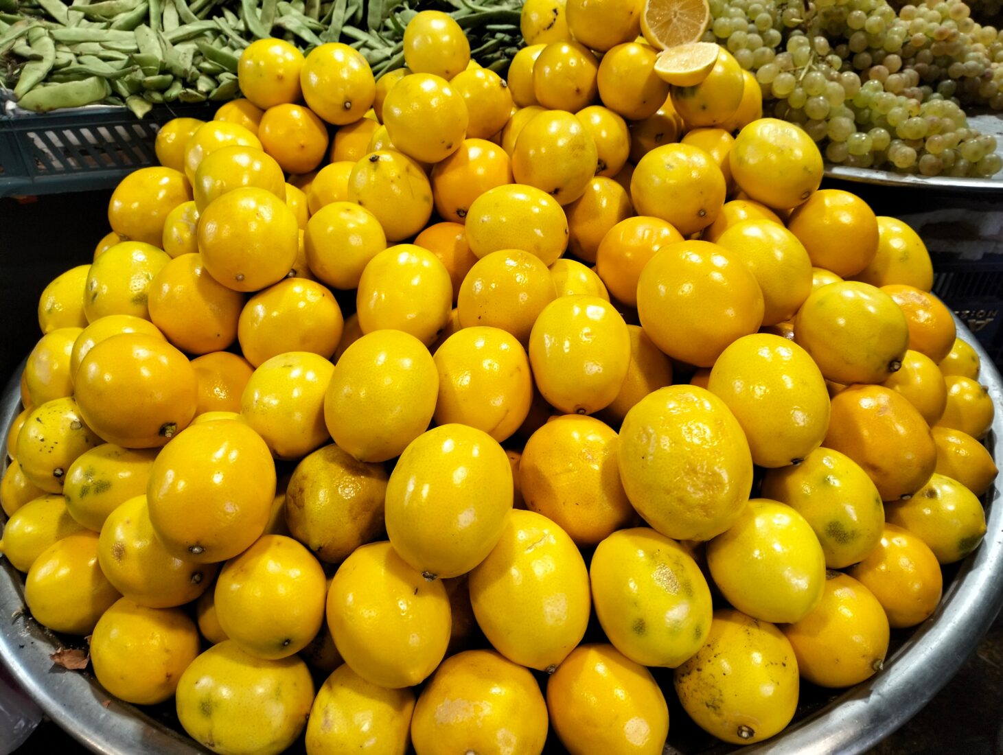 Fresh lemons stacked at a Turkish market stand