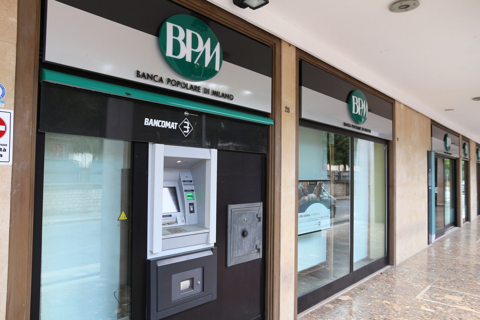 A Banca Popolare di Milano (BPM) branch with ATM in Altamura, Italy, on June 4, 2017. (Adobe Stock Photo)