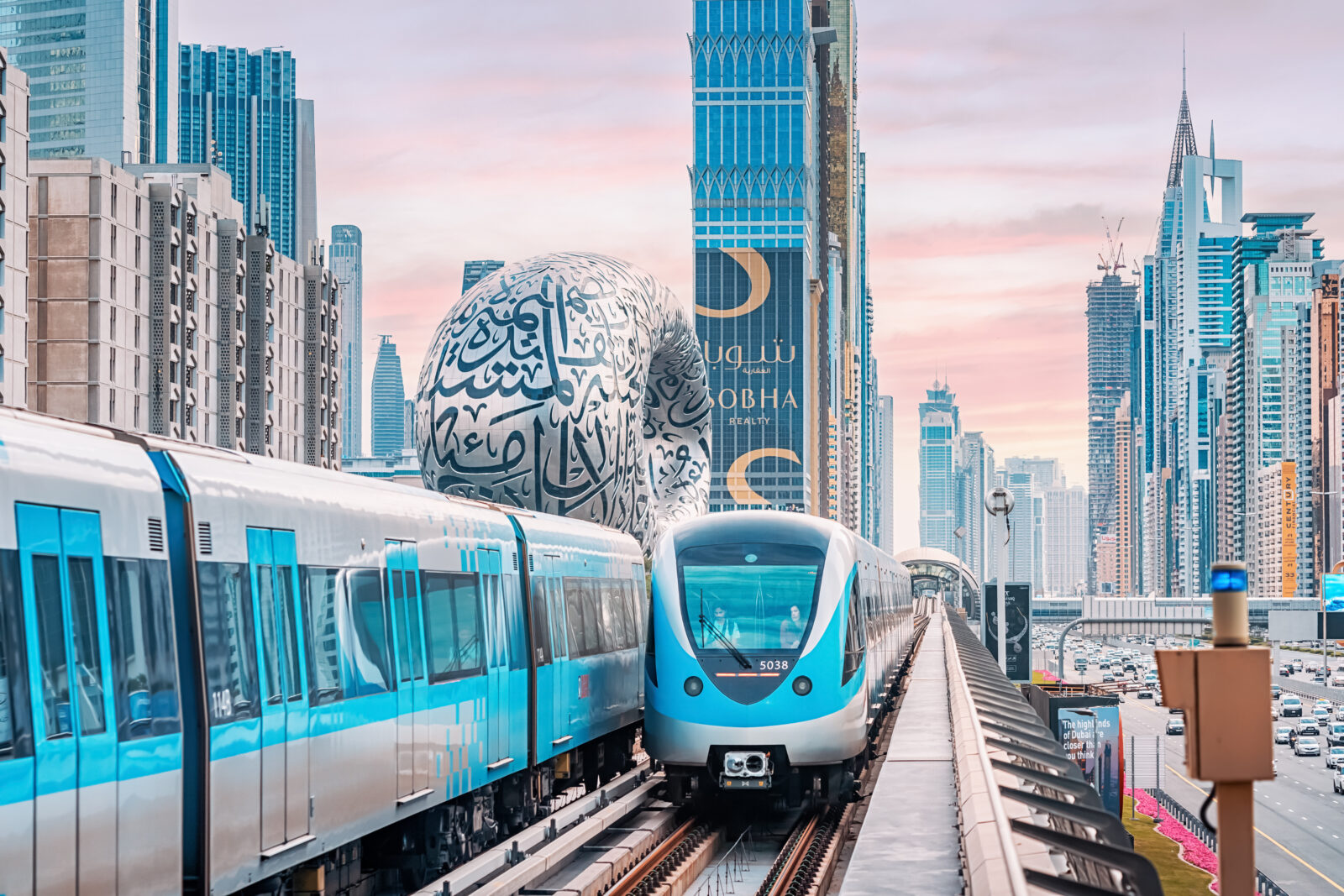 A train on the Dubai Metro Line passes near the Museum of the Future on January 13, 2023. (Adobe Stock Photo)