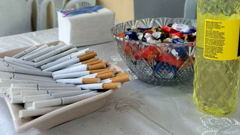 Cologne, candy and cigarettes on the table in a house in Nevsehir, Türkiye to be offered to guests, July 9, 2023. (Photo via Nevsehir Kent News)
