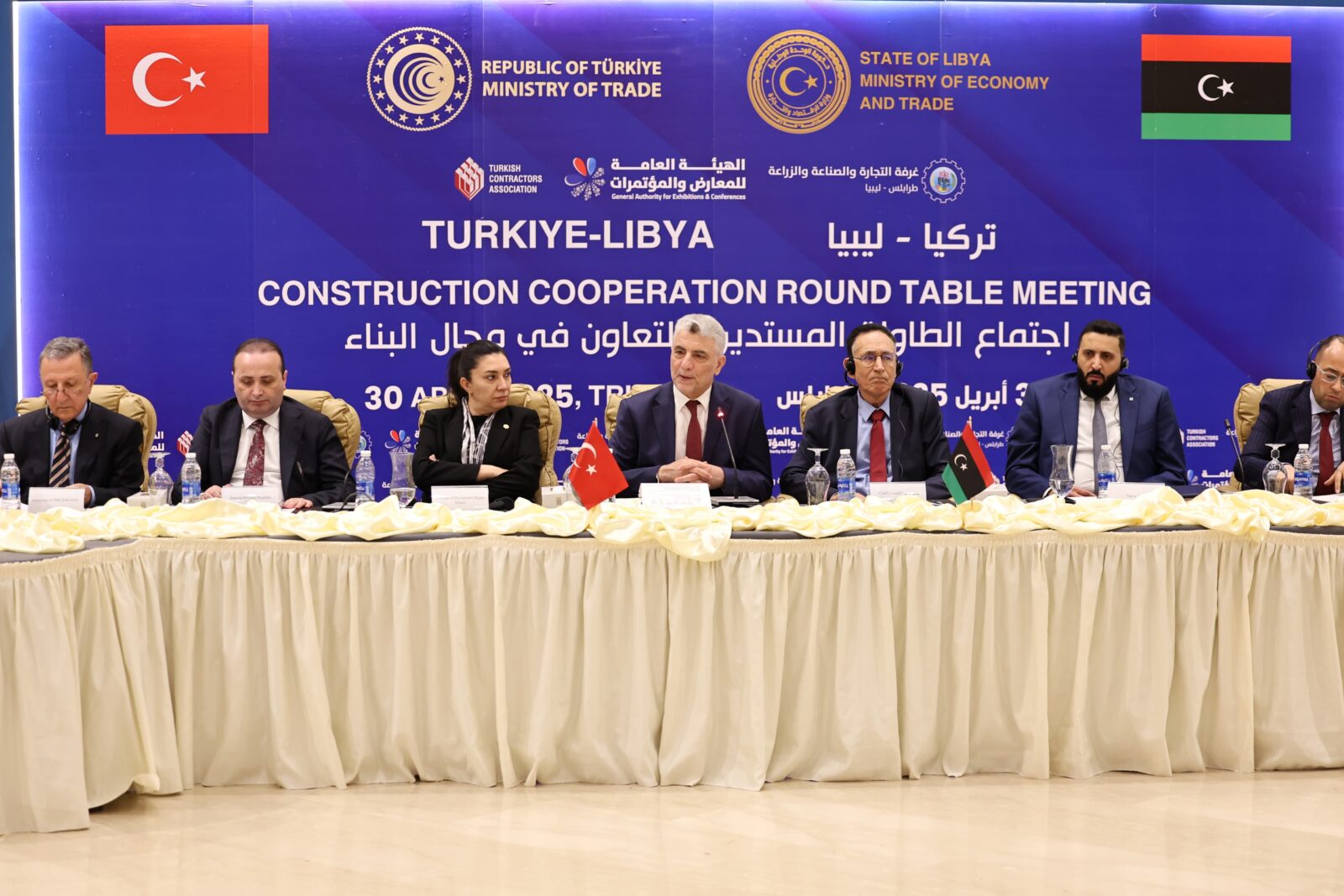 Turkish Trade Minister Omer Bolat (center) and Libyan Economy and Trade Minister Mohamed Hweij (third from right) attend the Türkiye–Libya Business Forum in Tripoli, Libya, on April 30, 2025. (AA Photo)