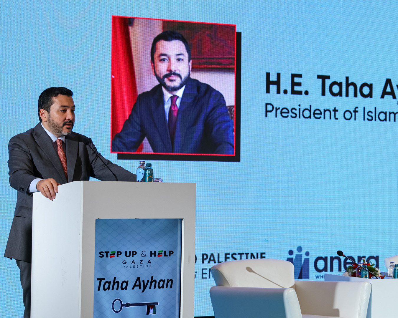 ICYF President Taha Ayhan delivers a speech at the 