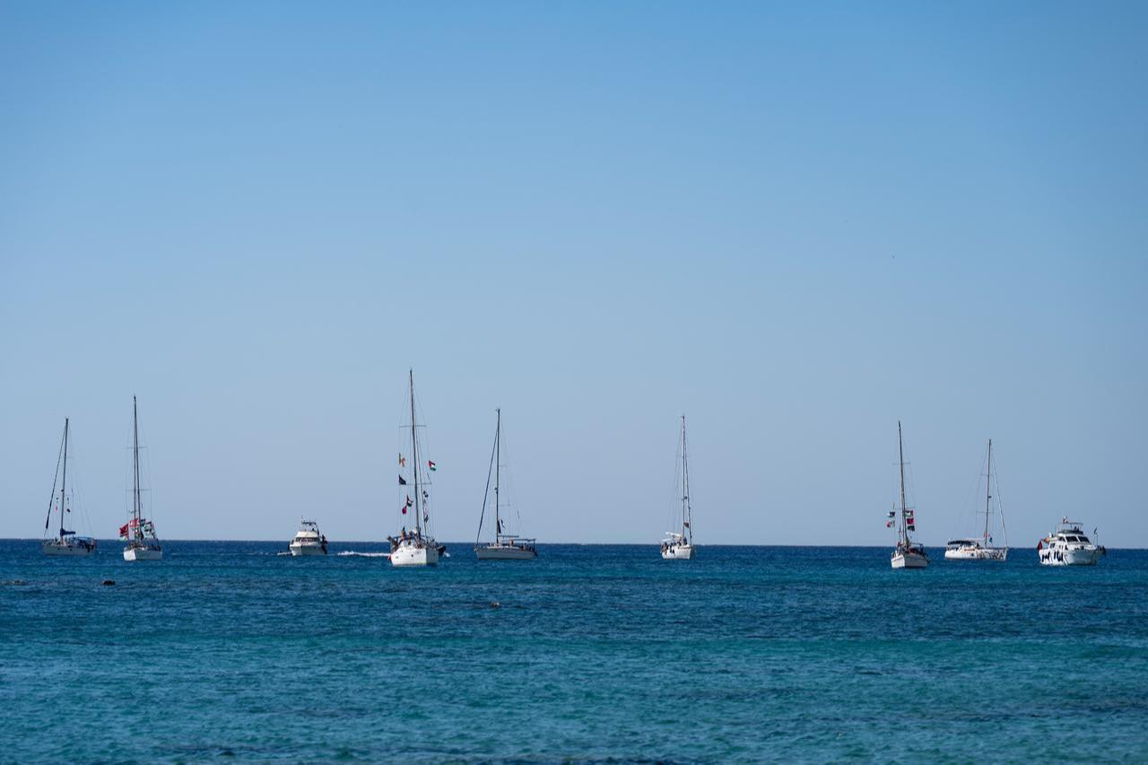 A group of ships of the Global Sumud Flotilla to Gaza are shown moored at the small island of Koufonisi, south of the island of Crete on Sept. 26, 2025. (AFP Photo)