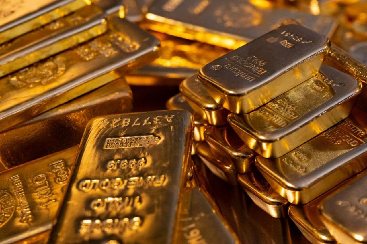 File photo shows stacked gold bars. (AFP Photo)