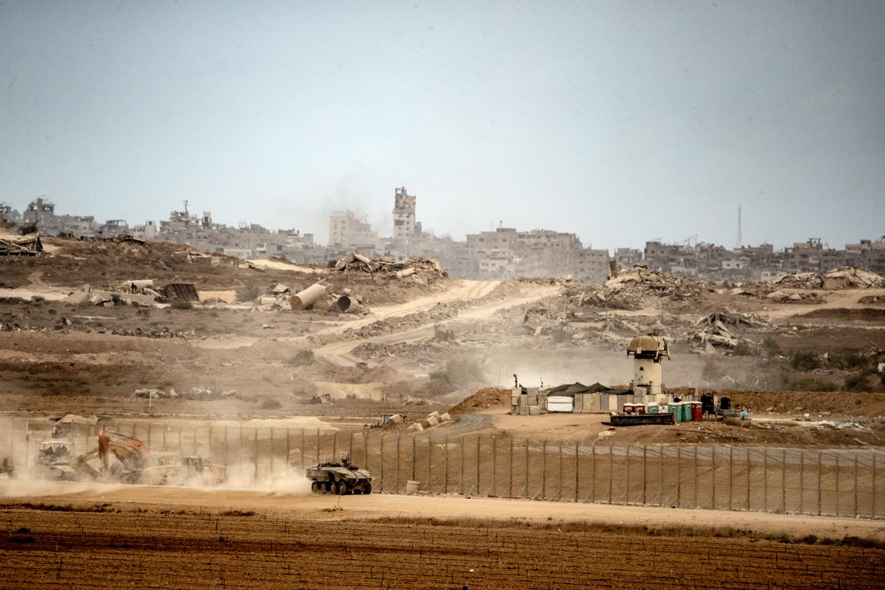 Israeli military vehicles are seen moving near the border, as seen from the Israeli city of Sderot near the border, Oct. 9, 2025. (AA Photo)
