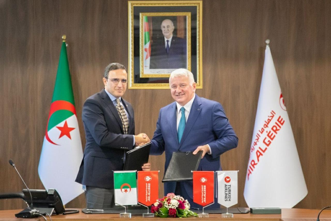 Turkish Airlines General Manager Bilal Eksi (R) and Air Algerie CEO Hamza Benhamouda (L) sign memorandum of understanding in Istanbul, Türkiye on Oct. 10, 2025. (AA Photo)