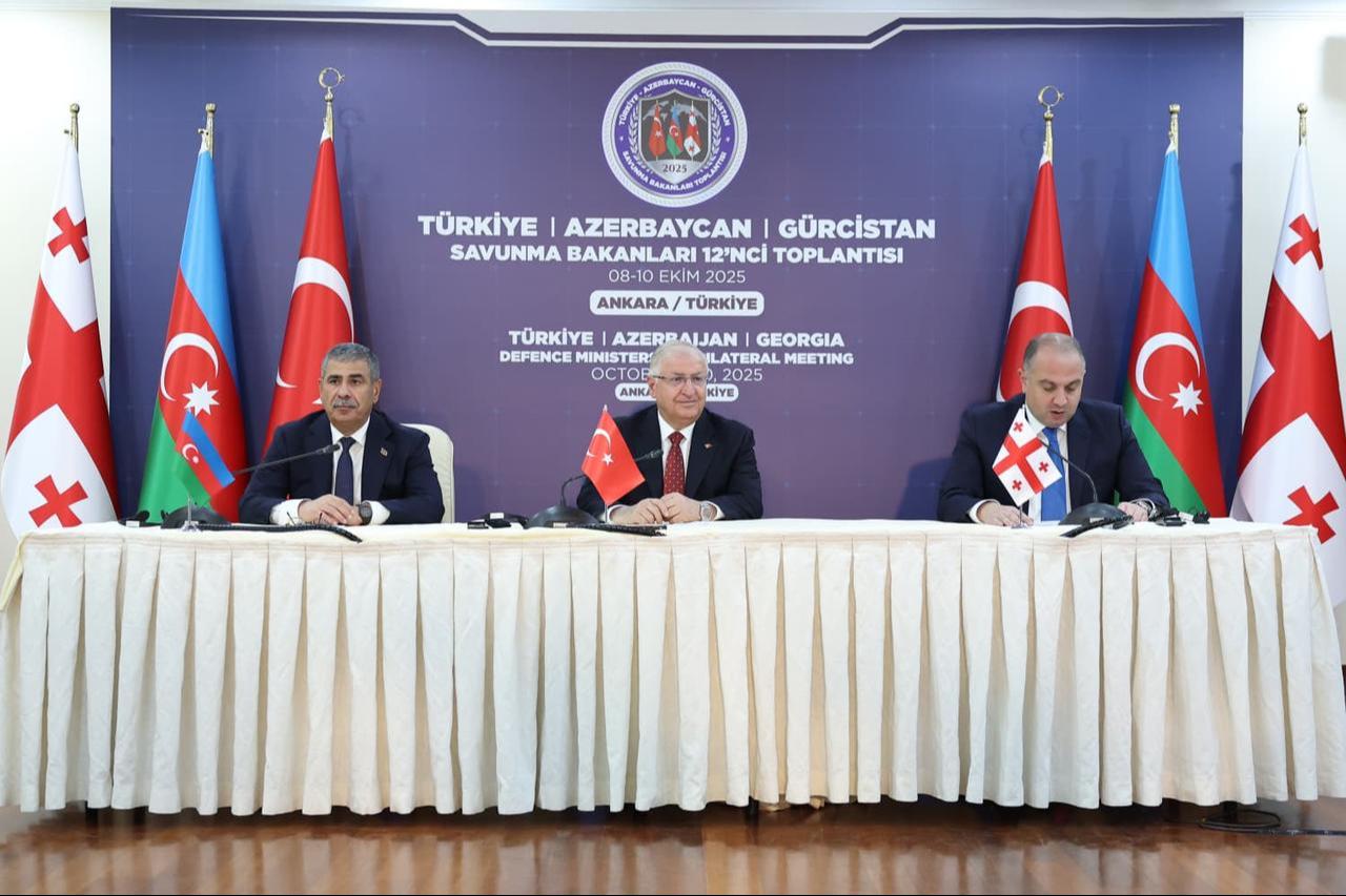 Georgian Defense Minister Irakli Chikovani (R) speaks during the Trilateral Defense Ministerial Meeting of Türkiye, Azerbaijan, and Georgia, Oct. 9, 2025, in Ankara, Türkiye. (Photo via Turkish MoD)